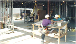 Commercial electrical contractors constructing an electrical system.